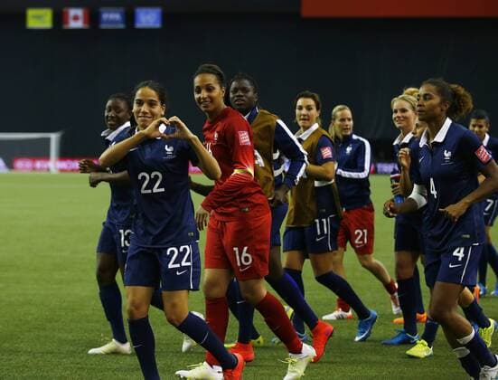 Players of France celebrate after the FIFA Women s World Canada 2015 round of 16 match between France and South Korea at Olympic Stadium in Montreal, Canada on June 21, 2015. France won the match 3-0. ) (SP)CANADA-MONTREAL-FIFA WOMEN S WORLD CUP-ROUND 16-FRANCE VS SOUTH KOREA DingxXu 