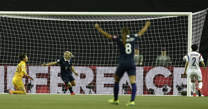 Eugenie Le Sommer (2nd L) of France celebrates team s first goal during the FIFA Women s World Canada 2015 round of 16 match between France and South Korea at Olympic Stadium in Montreal, Canada on June 21, 2015. France won the match 3-0. ) (SP)CANADA-MONTREAL-FIFA WOMEN S WORLD CUP-ROUND 16-FRANCE VS SOUTH KOREA DingxXu 