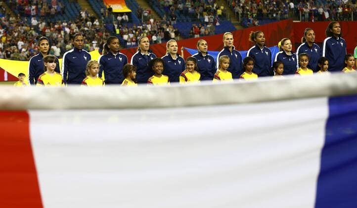 Players of France sing the national anthem before the FIFA Women s World Canada 2015 round of 16 match between France and South Korea at Olympic Stadium in Montreal, Canada on June 21, 2015. France won the match 3-0. ) (SP)CANADA-MONTREAL-FIFA WOMEN S WORLD CUP-ROUND 16-FRANCE VS KOREA DingxXu 