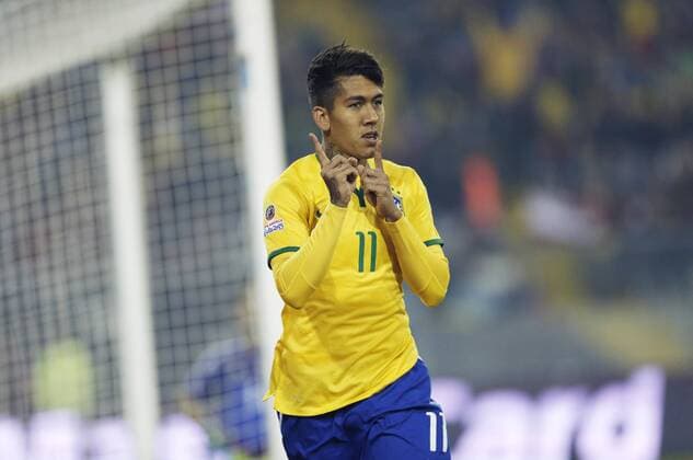 Brazil s Roberto Firmino celebrates after scoring during the Group C match at the 2015 America Cup against Venezuela, held at Monumental Stadium in Santiago, Chile, June 21, 2015. Brazil won 2-1. ) (vf) (SP)CHILE-SANTIAGO-COPA AMERICA-BRAZIL VS VENEZUELA JorgexVillegas 
