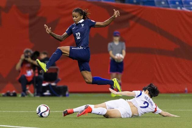 June 21, 2015 : France midfielder Elodie Thomis 12 jumps over Korea defender Lee Eunmi 2 during the 2015 FIFA Women s World Cup Round of 16 match between France and Korea at the Olympic Stadium in Montreal, Quebec, Canada. SOCCER: JUN 21 FIFA Women s World Cup - Round of 16 - France v Korea Icon15062113 EDITORIAL USE ONLY