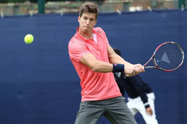 22.06.2015. Nottingham, England. Aegon Nottingham Open Tennis Tournament. Aljaz Bedene (Great Britain) on his way to winning the first set against Diego Schwartzman (Argentina) xDavidxKissmanx  ActionPlus11634206