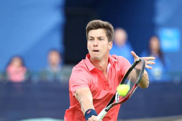 22.06.2015. Nottingham, England. Aegon Nottingham Open Tennis Tournament. Backhand volley from Aljaz Bedene (Great Britain) as he beats Diego Schwartzman (Argentina) in three sets xDavidxKissmanx  ActionPlus11634214