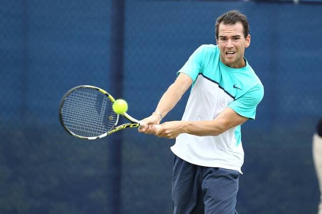 23.06.2015. Nottingham, England. Aegon Nottingham Open Tennis Tournament. A backhand from Adrian Mannarino (France) who beats Aljaz Bedene (Great Britain) in two sets xDavidxKissmanx  ActionPlus11634460