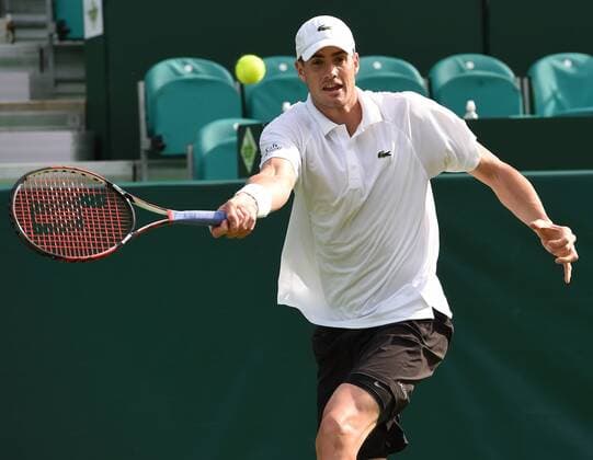 23.06.2015. Slough, England. The Boodles Tennis Tournament. John Isner (USA) plays his forehand in action against Lajovic (SRB) xJonxBromleyx  ActionPlus11634626