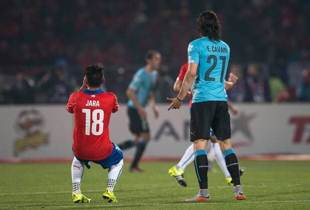 Chile-Uruguay SANTIAGO, CHILE - 24 06 2015: CHILE X URUGUAY - After provocations, chi21 and Gonzalo Jara of Chile jostle during match between Brazil vs Colombia, valid for the quarterfinals of the Copa America 2015 held at the National Stadium Julio Mart?nez Pr?danos. (Photo: Marcelo Machado de Melo FotoArena)  MarceloxMachadoxdexMelo