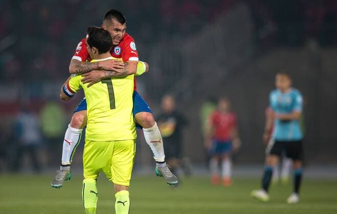 Chile v Uruguay. Copa America Championship 2015 . Chile s goalkeeper Claudio Bravo, left, and Gary Medel celebrate after the end game against uruguay for the group A of the 2015 Copa America football match at the National stadium in Santiago, Chile. 24 06 2015 Fotoarena Photosport Chile v Uruguay, Copa America 2015. 