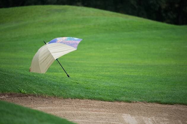 Aktuell Golf, Symbolfoto Muenchen Regenschirm auf dem Gruen, Stock, Golf Copyright: Vallejos xEibner-Pressefoto EP_avs