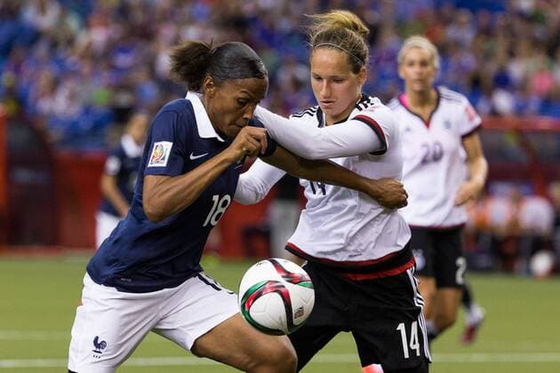 June 26, 2015 : France forward Marie Laure Delie 18 and Germany defender Babett Peter 14 fight for the ball during the 2015 FIFA Women s World Cup Quarter final match between Germany and France at the Olympic Stadium in Montreal, Quebec, Canada. SOCCER: JUN 26 FIFA Women s World Cup - Quarter-Final - Germany v France Icon15062612 EDITORIAL USE ONLY