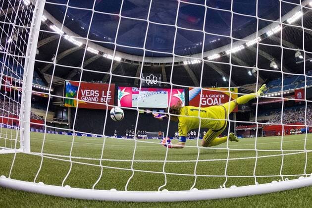 June 26, 2015 : Germany goalkeeper Nadine Angerer 1 makes a save on France midfielder Claire Lavogez 11 during the 2015 FIFA Women s World Cup Quarter final match between Germany and France at the Olympic Stadium in Montreal, Quebec, Canada. SOCCER: JUN 26 FIFA Women s World Cup - Quarter-Final - Germany v France Icon15062629 EDITORIAL USE ONLY