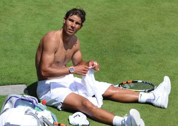 Aktuell Wimbledon, Training Rafael Nadal Tennis - 2015 Wimbledon Championships - Training - Saturday Rafa Nadal during his training session changes shirts COLORSPORT ANDREW COWIE 