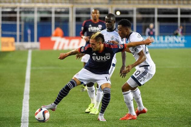 June 27, 2015 - Foxborough, Massachusetts, U.S. - New England Revolution forward Diego Fagundez (14) works to keep the ball inbounds during the MLS Fussball Herren USA game between Vancouver Whitecaps and the New England Revolution held at Gillette Stadium in Foxborough Massachusetts. Vancouver defeated New England 2-1. Eric Canha CSM MLS 2015: Whitecaps vs Revolution JUN 27 - ZUMAc04_