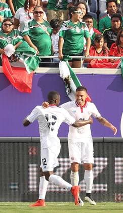 June 27, 2015 - Orlando, FL, USA - Costa Rica s David Ramirez (21) celebrates with teammate Jonathan Orozco (12) in front of frustrated Mexico fans in an International Friendly Länderspiel at the Orlando Citrus Bowl on Saturday, June 27, 2015, in Orlando, Fla. Mexico v. Costa Rica - ZUMAm67_