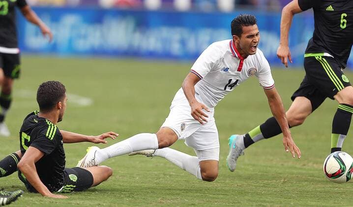 June 27, 2015 - Orlando, FL, USA - Costa Rica s Deyver Vega (14) collides with Mexico s Diego Reyes, left, in an International Friendly Länderspiel at the Orlando Citrus Bowl on Saturday, June 27, 2015, in Orlando, Fla. The game ended in a 2-2 draw. Mexico v. Costa Rica - ZUMAm67_