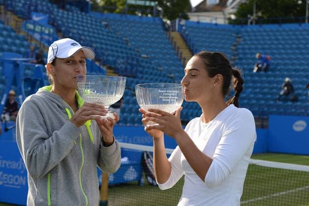 June 27, 2015 - Eastbourne, England - KATARINA SREBOTNIK of Slovenia (left) and CAROLINE GARCIA of France pose with the trophy after winning their doubles finals at The Aegon International Tennis Tournament in Eastbourne England on Saturday June 27 2015 Tennis 2015 - Aegon International - ZUMAl132