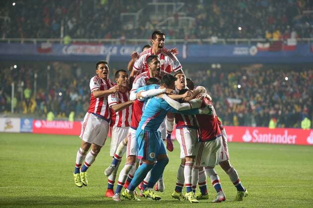 Paraguay s players celebrate victory after winning a quarter-final match between Brazil and Paraguay in Concepcion, Chile, June 27, 2015. Paraguay defeated Brazil 4-3 on penalties after a 1-1 draw thus qualified to the semi-final round. ) (SP)CHILE-CONCEPCION-AMERICAN CUP-QUARTERFINAL-BRAZIL VS PARAGUAY XuxZijian 
