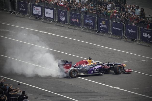 A driver of the Infiniti Red Bull racing team takes part in a F1 demonstration held on a racing circuit at the Zocalo Square of Mexico City, capital of Mexico, on June 27, 2015. Fans gathered on Saturday in the Zocalo of Mexico City to attend the exhibition of the Australian driver Daniel Ricciardo and the Spanish driver Carlos Sainz Jr. from Infiniti Red Bull racing team. With this, the Formula 1 prepares its return to Mexico, a country that does not host a race since 1992, and will again receive a F1 Grand Prix from Oct. 30 to Nov. 1, according to local press information. Alejandro Ayala) (jg) (SP)MEXICO-MEXICO CITY motor racing Motorsport F1 e AlejandroxAyala 