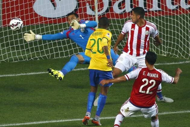 Football , Brazil v Paraguay. Copa America Championship 2015 . Brazil player Robinho, center, scores his goal against Paraguay during the 2015 Copa America football championship quarterfinal match at the Ester Roa stadium in Concepcion, Chile. 27 06 2015 Adrian Aylwin Photosport Brasil v Paraguay, Copa America 2015. 