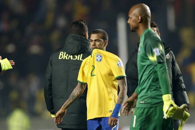Football , Brazil v Paraguay. Copa America Championship 2015 . Brazil s player Dani Alves, center, reacts losing against Paraguay after the 2015 Copa America football championship quarterfinal match at the Ester Roa stadium in Concepcion, Chile. 27 06 2015 Andres Pina Photosport Brasil v Paraguay, Copa America 2015. 