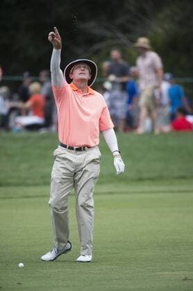 June 27, 2015 - Sacramento, CA, USA - Jimmy Carter throws grass to check the wind direction on the eleventh fairway during round three of the 36th U.S. Senior Open Championships at the Del Paso Country Club Saturday on June 27, 2015 in Sacramento, Calif. Golf 2015 - U.S. Senior Open - ZUMAs76_