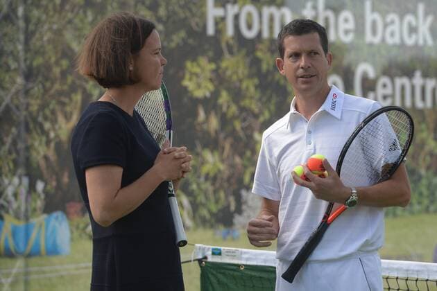 . 29 06 2015. London, United Kingdom. Tim Henman chats to Lindsay Davenport at a side event of the Wimbledon Championships. People queue up outside of Wimbledon Lawn Tennis Club to make sure they get tickets on the opening day of Wimbledon.  xBenxStevensx xixImagesx IIM-10633-0028