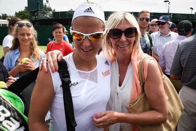- LONDON, UNITED KINGDOM: Belgian Kirsten Flipkens and her mother jubilate after the first round match between Belgian Kirsten Flipkens and German Annika Beck at the 2015 Wimbledon grand slam tennis tournament at the All England Tennis Club, in southwest London, Britain, Monday 29 June 2015. BENOITxDOPPAGNE  x04653709x