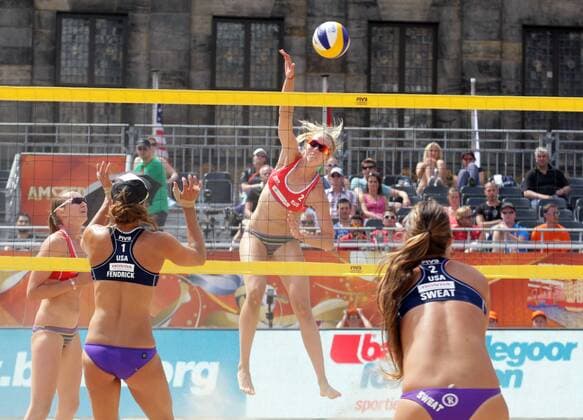 Ukolova (C) and Birlova (L) of Russia attacks Fendrick (2ndL) and Sweat (R) of USA during the FIVB Beach volleyball Beachvolleyball World Championships female match between Russia vs USA at pool A on June 29, 2015 in Amsterdam, Netherlands. Imago Paulo Amorim