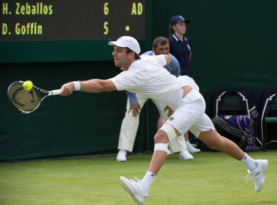 - LONDON, UNITED KINGDOM: Argentina s Horacio Zeballos plays a backhand during the first round match between Argentina s Horacio Zeballos and Belgian David Goffin at the 2015 Wimbledon grand slam tennis tournament at the All England Tennis Club, in southwest London, Britain, Monday 29 June 2015. Goffin won 6-7, 6-1, 6-1. BENOITxDOPPAGNE  x04653818x