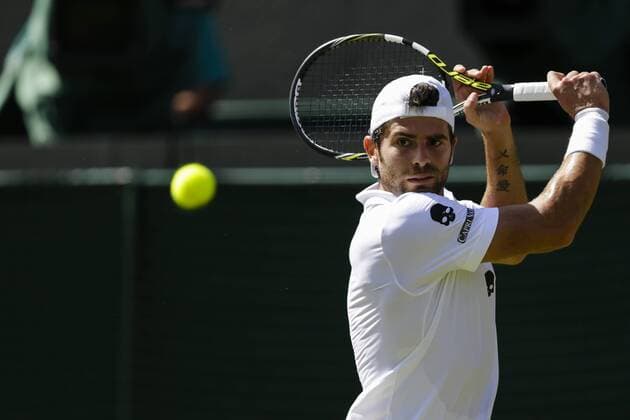 29.06.2015. Wimbledon, England. The Wimbledon Tennis Championships. Gentlemen& x2019;s Singles first round match between fifth seed Kei Nishikori (JPN) &amp; Simone Bolelli (ITA). Simone Bolelli in action xCraigxMercerx  ActionPlus11636194