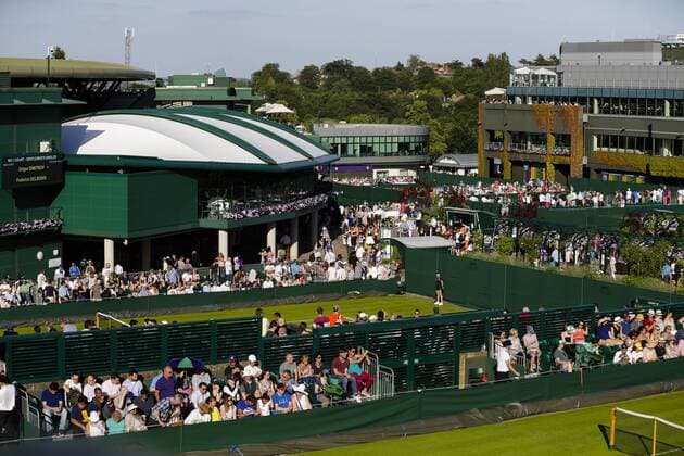 29.06.2015. Wimbledon, England. The Wimbledon Tennis Championships. A general view of some of the outside courts with presentation grandstand outside centre court. xCraigxMercerx  ActionPlus11636286
