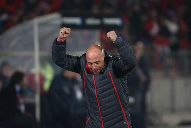 Chile s head coach Jorge Sampaoli reacts during a semi-final match between Chile and Peru of 2015 American Cup in Santiago, capital of Chile, June 29, 2015. Chile defeated Peru 2-1. ) (SP)CHILE-SANTIAGO-AMERICAN CUP-SEMIFINAL-CHILE VS PERU XuxZijian 