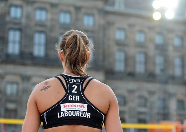 World Championships Beach volleyball Beachvolleyball 2015 The Netherlands World Championships Beach Volleyball 2015 The Netherlands 29th June 2015 Joy as German duo Julie Sude and Chantal Laboureur beat Maria Antonelli and Juliana da Silva (BRA) in a very close match on the Dam in Amsterdam. By winning the match the couple top their poule. Laboureur prepares to serve in the shadow of the Koninklijke Paleis. Photo Richard Wareham 