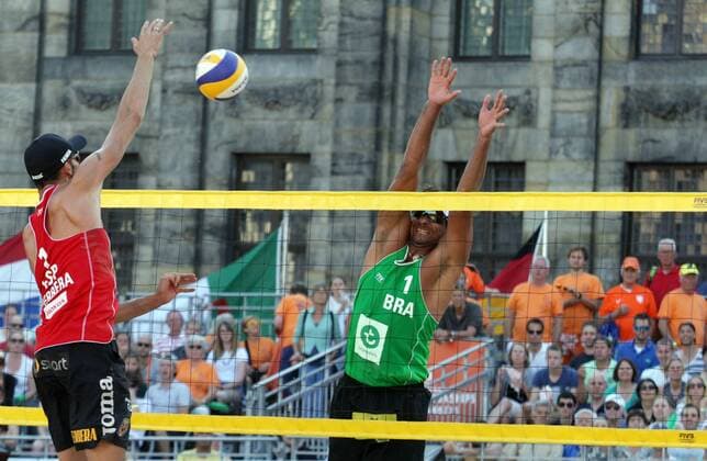 Herera (L) of Spain attacks Ricardo (R) of Brazil during the FIVB Beach volleyball Beachvolleyball World Championships male match between Brazil vs Spain at pool on June 30, 2015 in Amsterdam, Netherlands. Imago Paulo Amorim