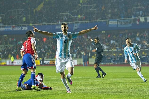 Argentina s player Javier Pastore, celebrates his goal against Edgar Benitez of Paraguay during the 2015 Copa America football championship semifinal match at the Ester Roa stadium in Concepcion . 30 06 2015 Adrian Macias Photosport Argentina v Paraguay, semifinal Copa America 2015. 