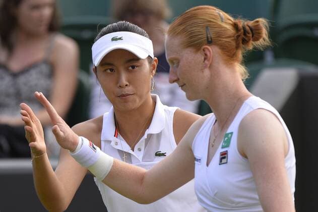 - LONDON, UNITED KINGDOM: Hao-Ching Chan and Belgian Alison Van Uytvanck pictured during the second round of the ladies doubles of Alison Van Uytvanck and Hao-Ching Chan against Johanna Konta and Maria Sanchez at the 2015 Wimbledon grand slam tennis tournament at the All England Tennis Club, in southwest London, Britain, Thursday 02 July 2015. BENOITxDOPPAGNE  x04656179x
