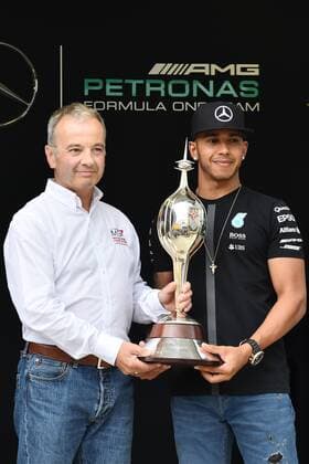 Atmosphere at Silverstone circuit before the Grand Prix of Great Britain. In this picture, Lewis Hamilton holds Memory of Hawthorn trophy by Rob Jones. xRVxRACINGxPRESSx  wo