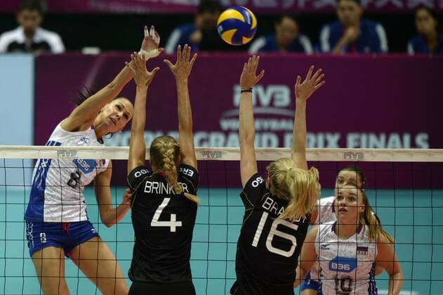 (150703) -- BEILUN, July 3, 2015 -- Obmochaeva (1st, L) of Russia spikes the ball during the match against Germany during the 2015 FIVB Volleyball World Grand Prix in Beilun, east China s Zhejiang Province, July 3, 2015. Russia won 3-1. ) (SP)CHINA-BEILUN-VOLLEYBALL-WORLD GRAND PRIX JuxHuanzong 