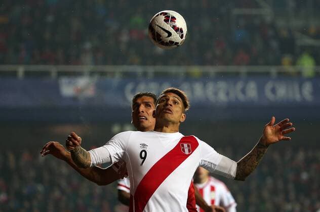 Aktuell Fußball, Copa America, Spiel um Platz 3, Peru - Paraguay Football, Peru v Paraguay. Copa America 2015. Peru s player Paolo Guerrero, right, battles for the ball against Marcos Antonio Caceres of Paraguay during the Copa America 2015 third place, at Bicentenario Ester Roa stadium. Concepcion, Chile. 03 07 2015 Dragomir Yankovic Photosport Peru v Paraguay, tercer lugar Copa America 2015. 