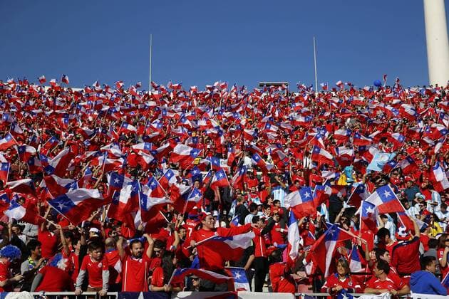 Football, Chile v Argentina Copa America 2015 . Chile s fans hold flags prior to the finals of the Copa America 2015 football match played against Argentina at the Nacional stadium in Santiago, Chile. 04 07 2015 Martin Thomas Photosport Chile v Argentina o00 Nationalteam , Copa America 2015. 