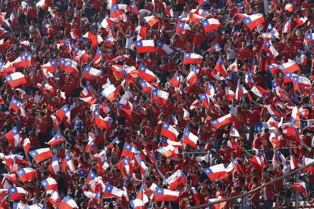 Football, Chile v Argentina Copa America 2015 . Chile s fans hold flags prior to the finals of the Copa America 2015 football match played against Argentina at the Nacional stadium in Santiago, Chile. 04 07 2015 Martin Thomas Photosport Chile v Argentina o00 Nationalteam , Copa America 2015. 