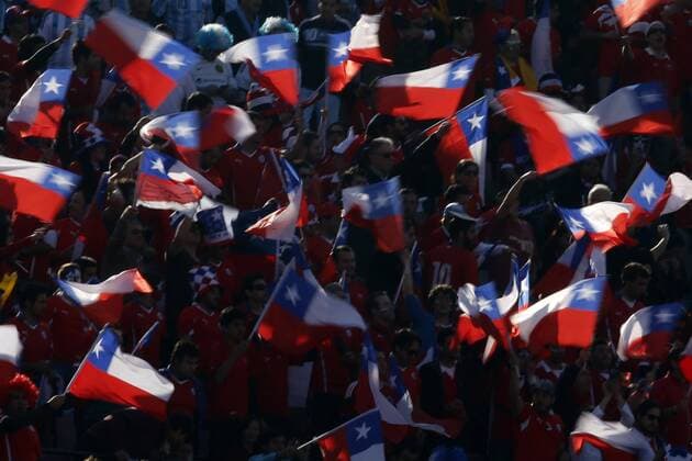Football, Chile v Argentina. Copa America 2015 . Chile s fans cheer their team prior to the finals of the Copa America 2015 football match played against Argentina at the Nacional stadium in Santiago, Chile. 04 07 2015 Andres Pina Photosport Chile v Argentina, Copa America 2015. 