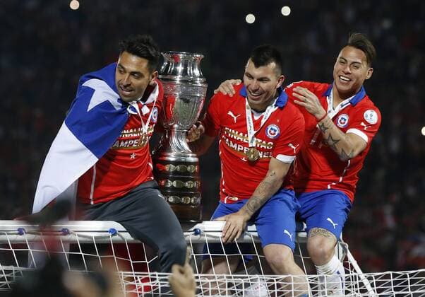 Football, Chile v Argentina. Copa America 2015 . Chile s players celebrate after winning the Copa America 2015 in a football match against Chile,Argentina at the Nacional stadium in Santiago, Chile. 04 07 2015 Martin Thomas Photosport Chile v Argentina, Copa America 2015. 