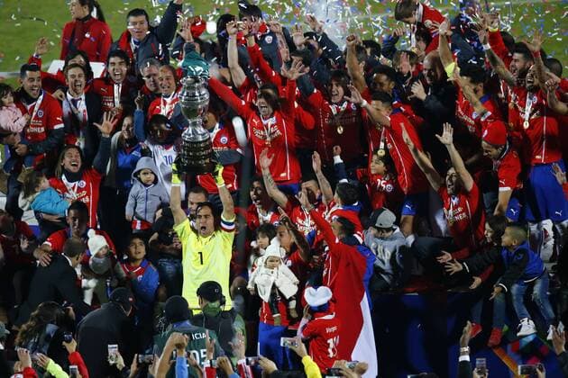 Football, Chile v Argentina. Copa America 2015 . Chile s, players lift the cup after winning the Copa America 2015 in a football match against Chile,Argentina at the Nacional stadium in Santiago, Chile. 04 07 2015 Christian Iglesias Photosport Chile v Argentina, Copa America 2015. 