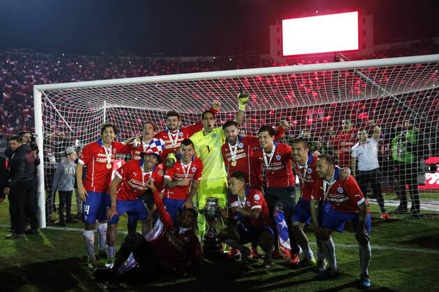 Football, Chile v Argentina. Copa America 2015 . Chile s players celebrate with the cup after winning the Copa America 2015 in a football match against Argentina at the Nacional stadium in Santiago, Chile. 04 07 2015 Andres Pina Photosport Chile v Argentina, Copa America 2015. 