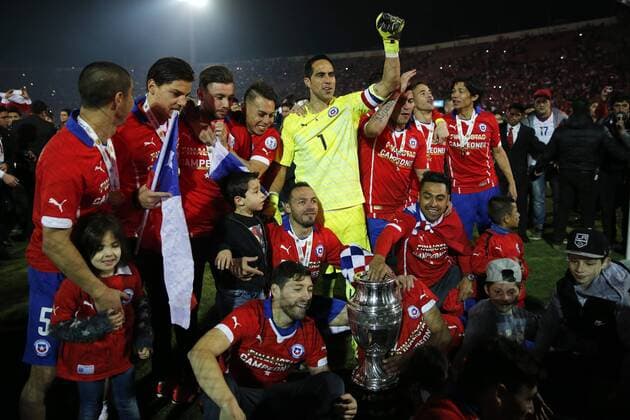 Football, Chile v Argentina. Copa America 2015 . Chile s players celebrate with the cup after winning the Copa America 2015 in a football match against Argentina at the Nacional stadium in Santiago, Chile. 04 07 2015 Andres Pina Photosport Chile v Argentina, Copa America 2015. 