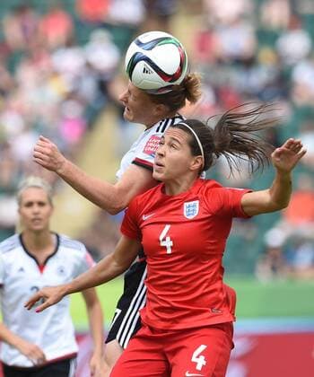 (150705) -- EDMONTON, July 5, 2015 -- Fara Williams (R) of England competes during the third place match of the FIFA 2015 Women s World Cup against Germany at Commonwealth Stadium, in Edmonton, Canada, on July 4, 2015. England defeated Germany 1-0 in extra time and won the third place of the FIFA 2015 Women s World Cup. ) (SP)CANADA-VANCOUVER-FIFA WOMEN S WORLD CUP-THIRD PLACE WangxYuguo 