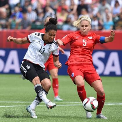 (150705) -- EDMONTON, July 5, 2015 -- Celia Sasic (L) of Germany shoots during the third place match of the FIFA 2015 Women s World Cup against England at Commonwealth Stadium, in Edmonton, Canada, on July 4, 2015. England defeated Germany 1-0 in extra time and won the third place of the FIFA 2015 Women s World Cup. ) (SP)CANADA-VANCOUVER-FIFA WOMEN S WORLD CUP-THIRD PLACE WangxYuguo 