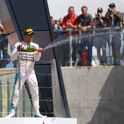 05.07.2015. Silverstone, Northants, England. Formula 1 British Grand Prix. Lewis Hamilton, Mercedes AMG Petronas F1 Team sprays the champagne after winning the Grand Prix for his 3rd British GP win xTimxWilliamsx  ActionPlus11638033