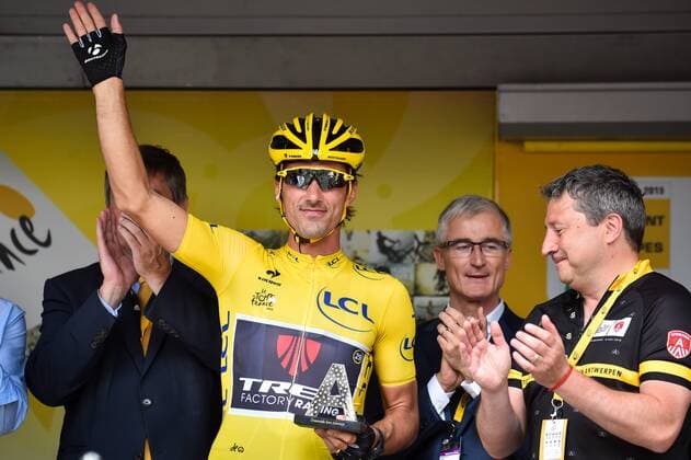 - ANTWERPEN, BELGIUM: Vice-Prime Minister and Interior Minister Jan Jambon, Swiss Fabian Cancellara of Trek Factory Racing, Flemish Minister-President Geert Bourgeois and Antwerp alderman Ludo Van Campenhout pictured ahead of stage 3 of the 102nd edition of the Tour de France cycling race, 159,5 km from Antwerp to Huy, Monday 06 July 2015. This year s Tour de France is taking place from 4 to 26 July. LUCxCLAESSEN  x04658758x