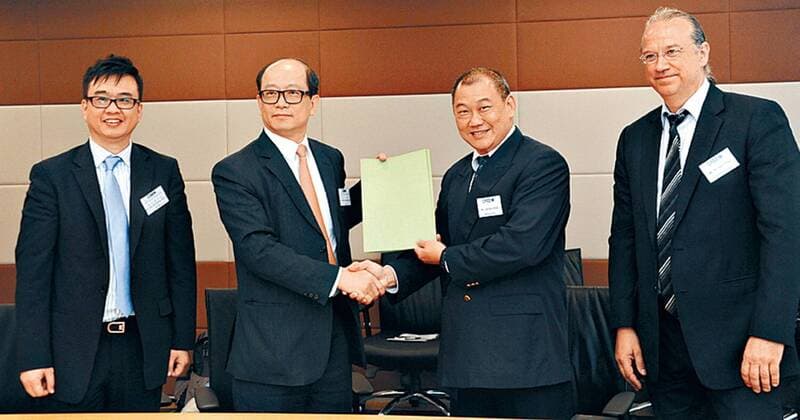 --FILE--Li Wing-Sang, second left, CEO of Hong Kong-listed electrical components manufacturer Ledus, poses during a signing ceremony for the strategic cooperation of Ledus and Cree in Hong Kong, China, 12 April 2012. Chinese hi-tech company Ledus on Monday (18 May 2015) moved a step closer to taking over French second-division soccer club FC Sochaux from carmaker Peugeot, signing paperwork that could pave the way for an outright purchase by next season. The seven-million-euro ($7.9 million) deal was set in motion in February by Hong Kong-listed electrical components manufacturer Ledus, a subsidiary of Tech Pro. Sochaux said Monday s joint signature validates terms of the letter of intention signed in February and confirmed the planned transfer of 100 percent of the club s shares, describing it as another step for the two parties. The terms of this agreement fully meet the objective 20120413_25528 FILE Li Wing Sang second left CEO of Hong Kong listed electrical components manufacturer Ledus  imago 64595522